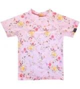 Remera UV campo de flores mangas cortas