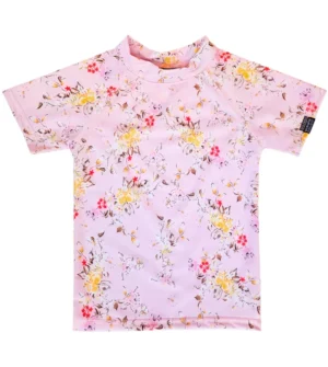 Remera UV campo de flores mangas cortas